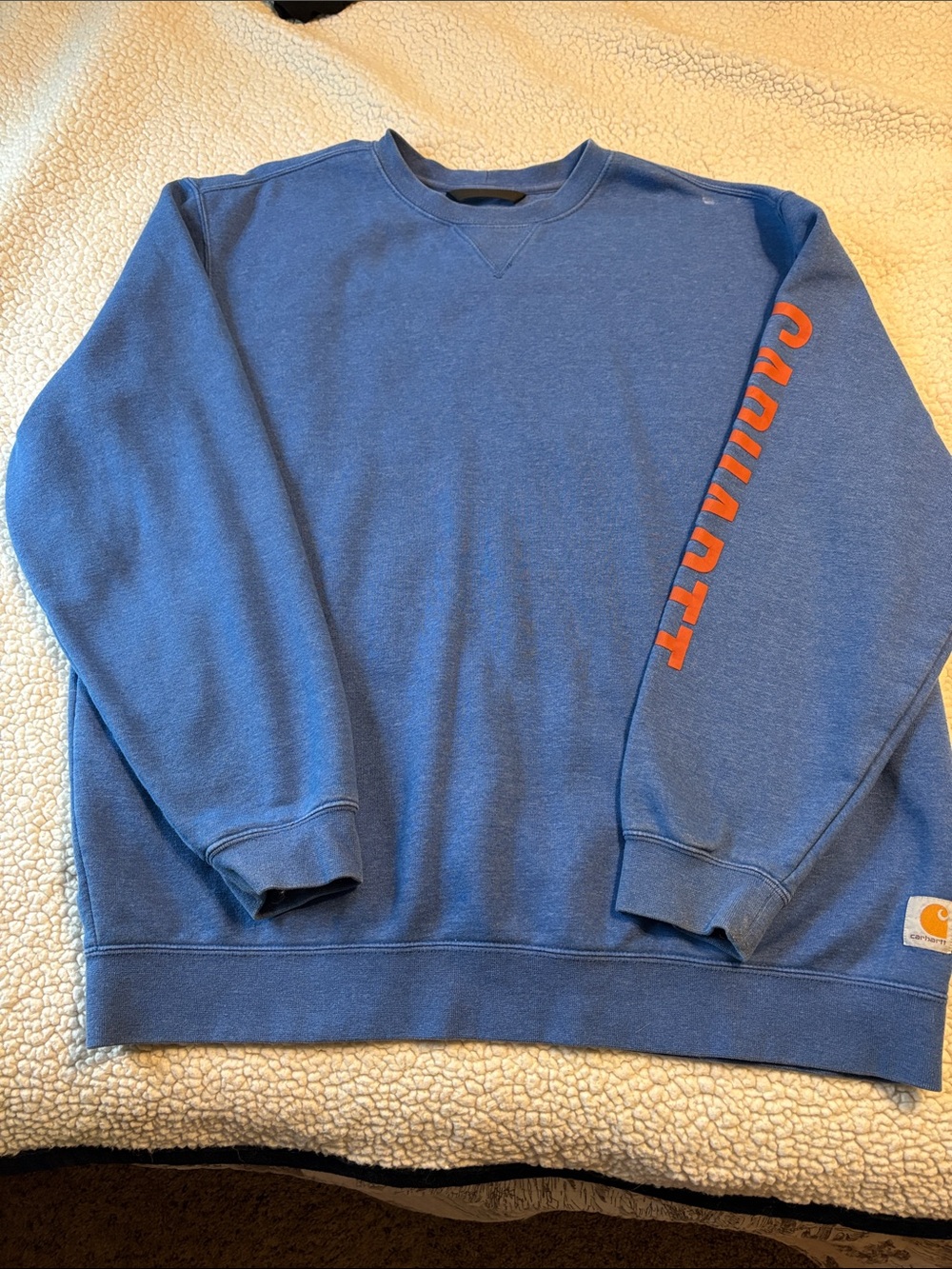 Carhartt Blue Crewneck Sweatshirt with Orange Sleeve Text